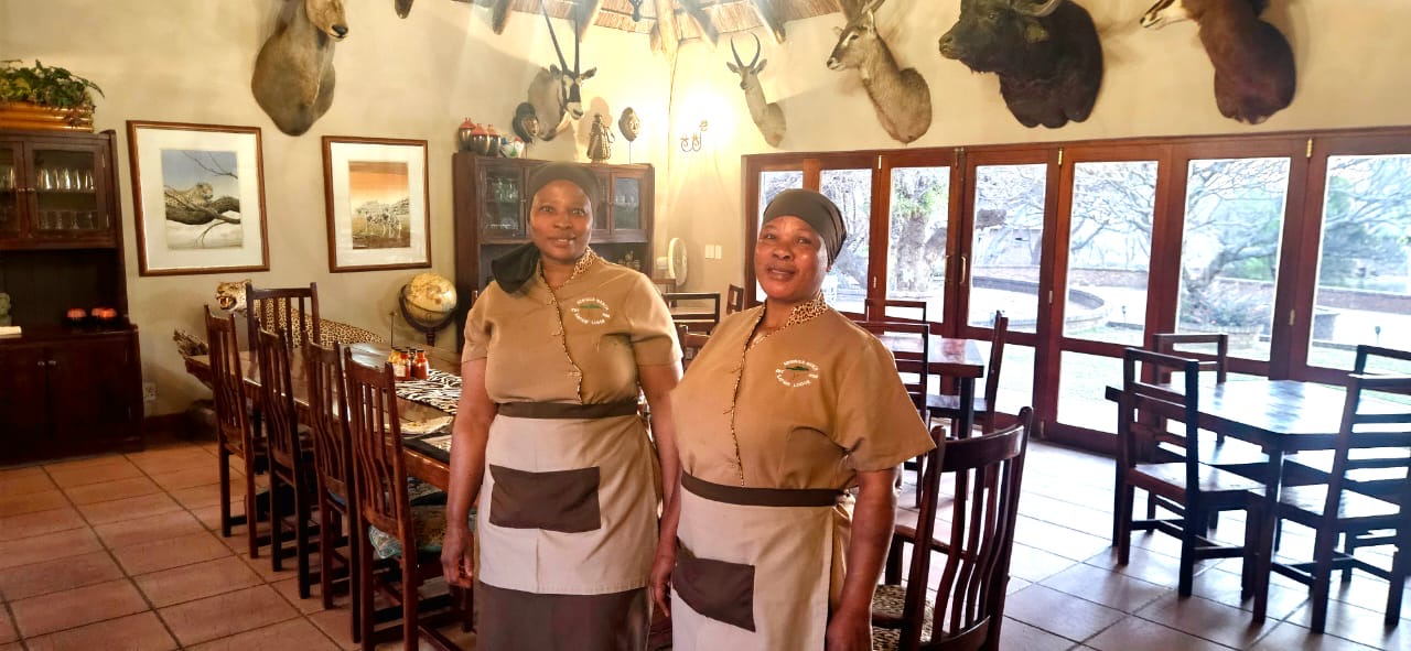 Two Seringa team members in the dining room